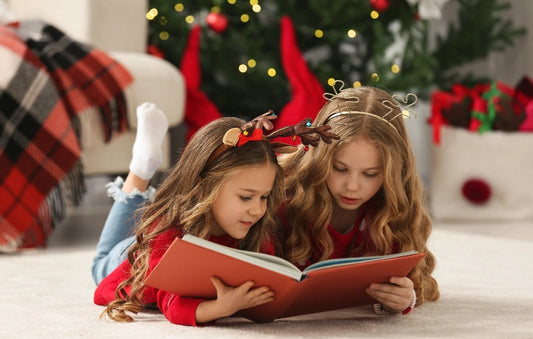Children looking at a Christmas photo album